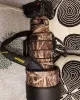 Nikon Z600mm F/4 TC VR S Lens Cover (Green jungle camouflage) Nikon Z600mm F/4 TC VR S Lens Cover (Green jungle camouflage)